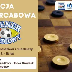 Drewniana szachownica z pionkami do gry w warcaby.
